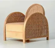  ??  ?? Wood and rattan are mixed in the deco-inspired Arch chair from Kiwi designers Douglas and Bec.