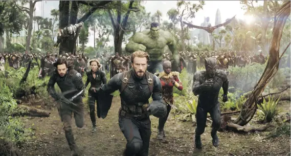  ?? PHOTOS: DISNEY ?? Captain American leads a horde of superheroe­s into battle in Avengers: Infinity War. Having so much star power assembled in one place has critics divided.