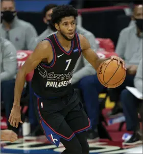  ?? CHRIS SZAGOLA — THE ASSOCIATED PRESS ?? Rookie guard Isaiah Joe, seen in the Jan. 9 game against Denver, has made the most of his recent run of minutes amid the 76ers injury and illness absences.