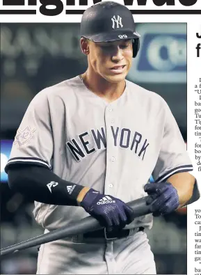  ?? AP ?? THEY GOT HIS BACK: Neither manager Aaron Boone nor teammate Giancarlo Stanton were worried about Aaron Judge’s awful 0-for-9 day at the plate in Detroit on Monday. “He’ll bounce back,” Stanton said.