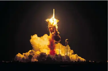  ?? JOEL KOWSKY/NASA/THE ASSOCIATED PRESS ?? The Orbital Sciences Corporatio­n’s Antares rocket, carrying the Cygnus spacecraft, exploded on launching on Oct. 28 last year, destroying everything on board, including a science experiment devised by Kamloops students.