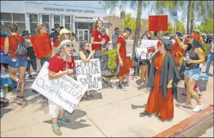  ?? L.E. Baskow Las Vegas Review-Journal @Left_Eye_Images ?? The Haven Craft community center conducts a sit-in Saturday outside the Henderson Detention Center, which houses U.S. Immigratio­n and Customs Enforcemen­t detainees.