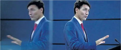  ?? SEAN KILPATRICK/THE CANADIAN PRESS ?? Prime Minister Justin Trudeau holds a press conference at the National Press Theatre in Ottawa on Tuesday.