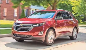  ?? CHEVROLET VIA AP ?? The 2018 Chevrolet Equinox comes standard with features both parents and teens will appreciate, from Android Auto and Apple CarPlay compatibil­ity to Chevy's Teen Driver system, which acts as a watchdog when young drivers are behind the wheel.