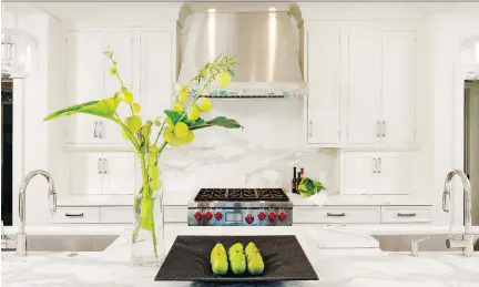  ?? BOB NAROD. ?? This Jennifer Gilmer kitchen features honed marble, a material some designers have steered clients away from due to its relative fragility.