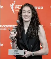  ?? Mary Altaffer/associated Press ?? New York Liberty forward Breanna Stewart holds her WNBA MVP trophy during a news conference on Tuesday.