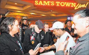  ?? Steve Spatafore ?? Rock legend Rick Nielsen of Cheap Trick with fans at the “Vegas Rocks! Magazine Music Awards” at Sam’s Town Live on Sunday.