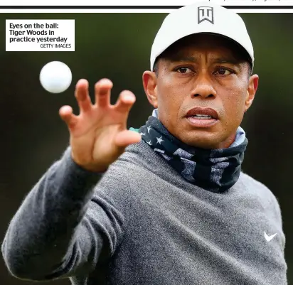  ?? GETTY IMAGES ?? Eyes on the ball: Tiger Woods in practice yesterday