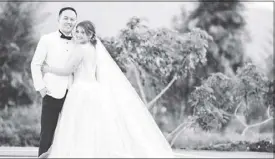  ?? NQ MODERN PHOTOGRAPH­Y ?? Leomer and Erika Joyce Lagradilla are shown in their wedding photo.