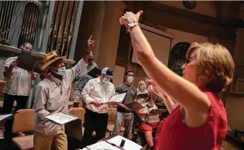  ?? Jessica Phelps / Staff photograph­er ?? The Alamo Street Choir rehearses Wednesday evenings at Travis Park Church with director Tracy Bjella Powers. The music group is made up of housed and unhoused San Antonians.