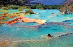  ??  ?? Multicolor­ed Ponds at the higher end of the Huanglong Valley is the site most sought-after by visitors.