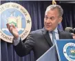  ?? DREW ANGERER, GETTY IMAGES ?? New York Attorney General Eric Schneiderm­an on Tuesday announced the results of “Operation Child Tracker.”