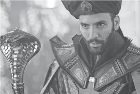  ?? DANIEL SMITH ?? Jafar (Marwan Kenzari) has ambitions to rule the kingdom of Agrabah. But the actor’s hotness is hard to discern here.