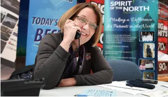  ?? CITIZEN PHOTO BY BRENT BRAATEN ?? Local MLA Shirley Bond works the phones for Spirit of the North’s second annual Spirit Day fundraiser on Thursday.