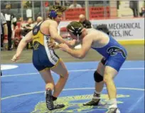  ?? STAN HUDY - SHUDY@DIGITALFIR­STMEDIA.COM ?? Averill Park’s Nik Koch escapes from Albany’s Creedence Cameron in the second period of the Section II Division 1 220-pound championsh­ip match Saturday at the Cool Insuring Arena in Glens Falls. February, 10, 2018.