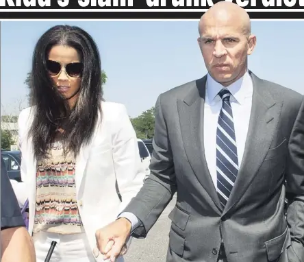  ??  ?? AFOUL OF THE LAW: Jason Kidd at court yesterday with wife Porschla Coleman before his DWI guilty plea.