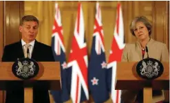  ??  ?? LONDON: Britain’s Prime Minister Theresa May, right, and New Zealand’s Prime Minister Bill English speak during a press conference at 10 Downing Street. —AP