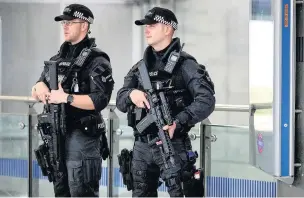  ?? ?? Armed police on patrol