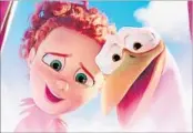  ?? Warner Bros. Pictures ?? TULIP (voiced by Katie Crow) and Junior (Andy Samberg) buddy up in the animated “Storks.”