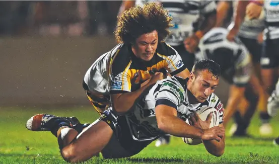  ?? Picture: ZAK SIMMONDS ?? UNRELENTIN­G BATTLE: Brothers’ Thomas Conn is tackled by Centrals Joseph Munro in their game at Jack Manski Oval.