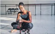  ??  ?? Above: Ingrid Silva paints her pointe shoes with makeup.