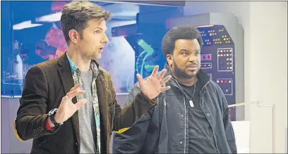  ?? [FOX] ?? Max (Adam Scott), left, and Leroy (Craig Robinson), drawn together in “Ghosted”