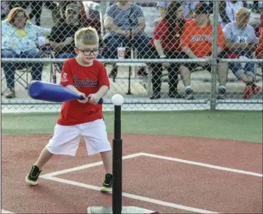  ?? The Sentinel-Record/Grace Brown ?? MIRACLE LEAGUE: Hudson Williams, 7, of Hot Springs, warms up on the tee in preparatio­n for a game at the Miracle League for Garland County baseball field at the Donald B. Trantham Park during the field’s grand opening last Tuesday. Plans for the park began in late 2012.