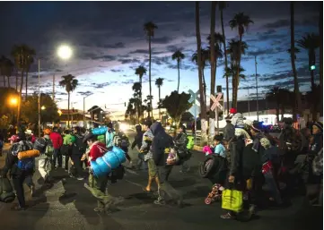  ?? — AFP photo ?? File photo shows central American migrants -mostly Hondurans- moving towards the United States in hopes of a better life, in the Mexican border city of Mexicali, Baja California state on their way to Tijuana, Mexico.