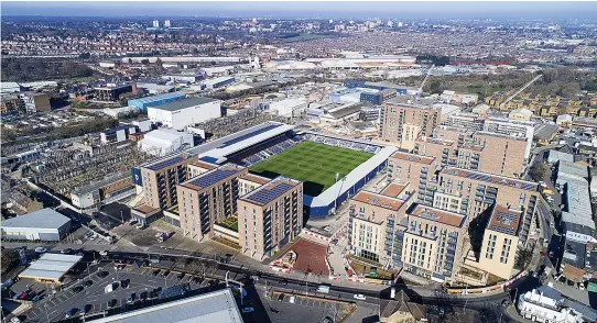  ??  ?? FEVER PITCH: The Wimbledon Grounds developmen­t overlooks League One AFC Wimbledon’s spiritual home, Plough Lane