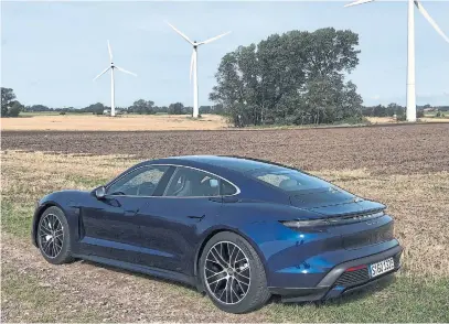  ?? NORRIS MCDONALD PHOTOS FOR THE TORONTO STAR ?? The Porsche Taycan Turbo is an all-electric sports car, and wind power is tabbed to be one way to produce clean energy.