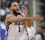  ?? CHRIS CARLSON — THE ASSOCIATED PRESS ?? Kansas State’s Markquis Nowell celebrates after scoring during Sunday’s NCAA Tournament victory over Kentucky.