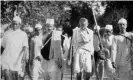  ?? ?? Mahatma Gandhi on a march in 1930 as part of his peaceful resistance to British rule. Photograph: Universal History Archive/Getty Images