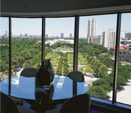  ?? Melissa Phillip / Staff photograph­er ?? The view from a unit on the 10th floor at The Parklane, 1701 Hermann Drive, is shown May 26. Tema Developmen­t launched a modernizat­ion of the 35-story tower overlookin­g Hermann Park.