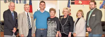  ??  ?? Ty Cook (center) is this year’s Teacher of the Year for the Catoosa County school system.