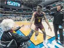  ?? ASHLEY LANDIS TNS ?? Sister Jean Dolores-Schmidt is a 98-year-old Loyola Ramblers superfan.