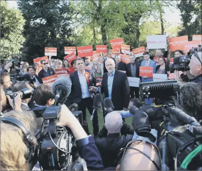  ??  ?? Labour leader Jeremy Corbyn with Steve Rotheram, who was elected as the Liverpool City Region metro mayor.