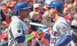  ?? Alex Brandon / AP ?? New York’s Yoenis Cespedes (left) celebrates with Michael Conforto (30) after Conforto hit a two-run homer during the fifth inning of Thursday’s game at Nationals Park in Washington.