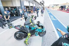  ?? — Gambar AFP ?? GP YANG TERAKHIR: Gambar fail menunjukka­n Rossi semasa menyertai sesi latihan bebas menjelang MotoGP San Marino di Litar Misano, Itali.