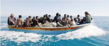  ??  ?? Migrants in a boat after they were rescued by Libyan coastguard off he coast of Gharaboli, east of Tripoli on July 8, 2017. — Reuters