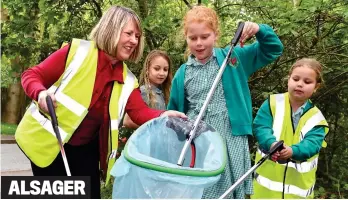  ?? ?? Fill it up: Alsager Highfields Primary School pupils with local MP Fiona Bruce