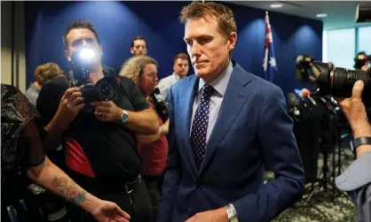  ?? Photograph: Stefan Gosatti/AFP/Getty Images ?? Christian Porter leaves Wednesday’s press conference. Scott Morrison has rejected calls for an independen­t inquiry into the rape allegation against his minister.