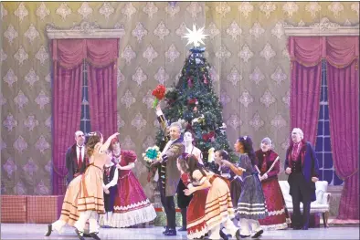  ?? H John Voorhees III / Hearst Connecticu­t Media ?? The Danbury Music Center will present its production of The Nutcracker Ballet this weekend, which includes more than 200 dancers and the Danbury Symphony Orchestra. The production runs at 2:30 p.m. and 7 p.m. on Saturday and 3 p.m. on Sunday, in the Danbury High School auditorium. Previous showtimes were incorrect. Tickets can be purchased at the door or at www.danburymus­iccenter.org.