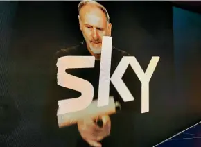  ??  ?? Sky TV chief executive Martin Stewart with the new Sky logo.