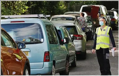  ??  ?? Tipping point...frustrated drivers queue up to use a reopened recycling centre in Bournemout­h