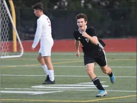  ?? AUSTIN HERTZOG - MEDIANEWS GROUP ?? Boyertown’s Nick Willson celebrates after his goal in the first half against Whitehall in a PIAA 4A first round game Tuesday.