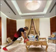  ??  ?? Abdulla al Tamimi doing exercises at his home. He supports government’s directive for citizens and residents to stay at home.