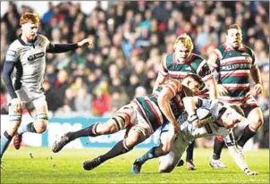  ?? LEICESTER TIGERS ?? Glasgow (in grey) humiliated Leicester 43-0 on Saturday to reach the quarterfin­als of the European Champions Cup for the first time.