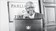  ?? TSVANGIRAY­I MUKWAZHI ASSOCIATED PRESS FILE PHOTO ?? Tendai Biti, a Zimbabwean opposition official, was arrested Wednesday while trying to cross into Zambia, which has denied him asylum.