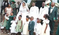  ?? ?? Vice President Constantin­o Chiwenga, his wife Colonel Miniyothab­o Chiwenga and former Namibian Defence Force commander Lieutenant General Epaphras Denga Ndaitwah pose for a photo with flower girls and page boys