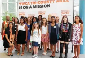  ?? MICHILEA PATTERSON — DIGITAL FIRST MEDIA ?? YWCA Director of Program Developmen­t Sheri McDonald, far left in front, poses with the girls that were nominated for the first Tribute to Exceptiona­l Girls which was held at The Hill School on Saturday.